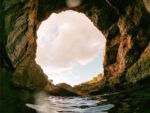 large opening looking out from cave in majorca
