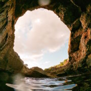 large opening looking out from cave in majorca