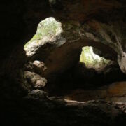 Rock cave with two openings to the outside.