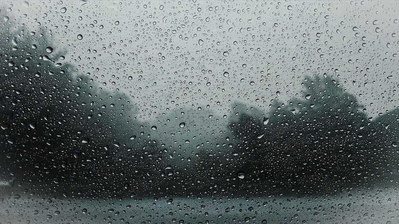 StormFreePhotospixabay looking at rain through window