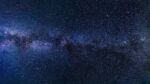 dark outer space with thousands of small stars