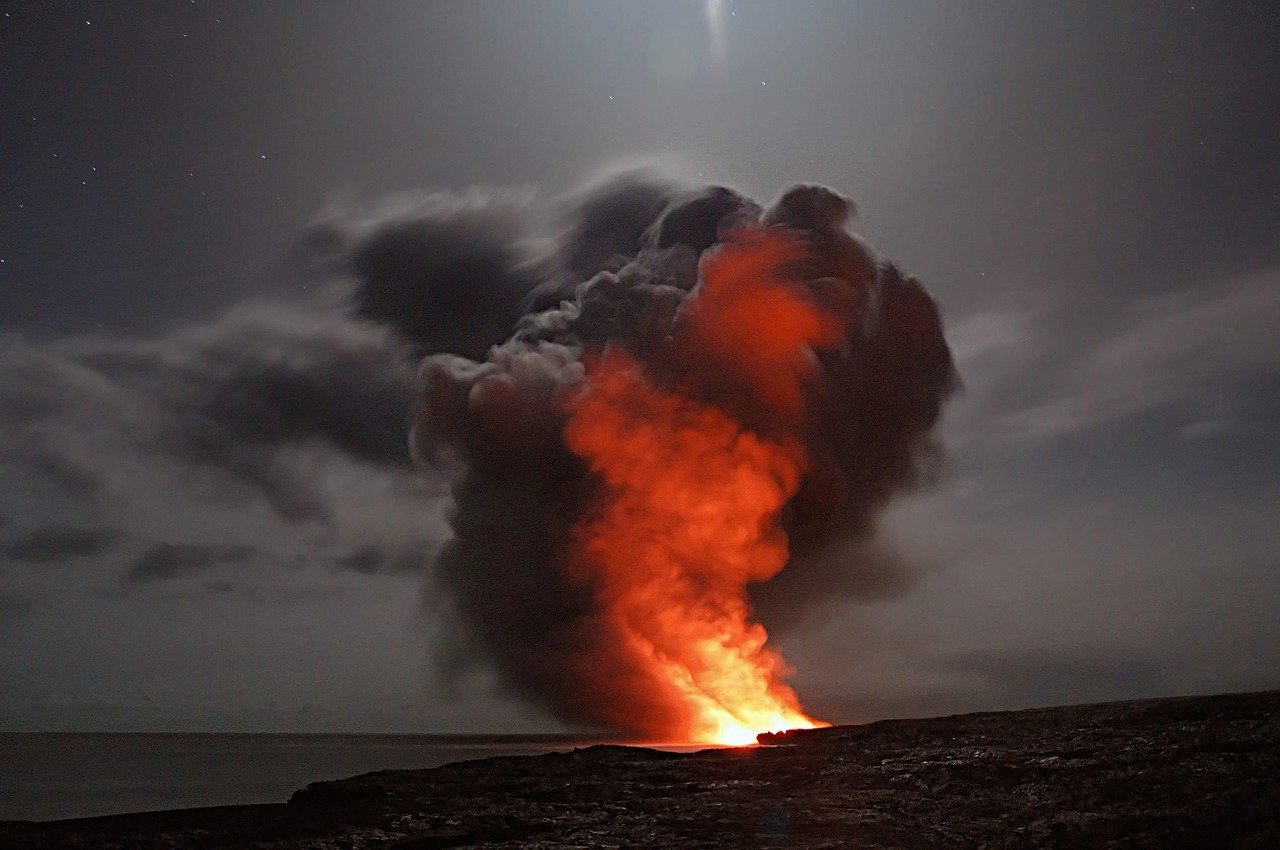 ruptureAdrianMalecpixabay a volcano erupting at water's edge