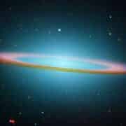 A colorful, circular galaxy in space.