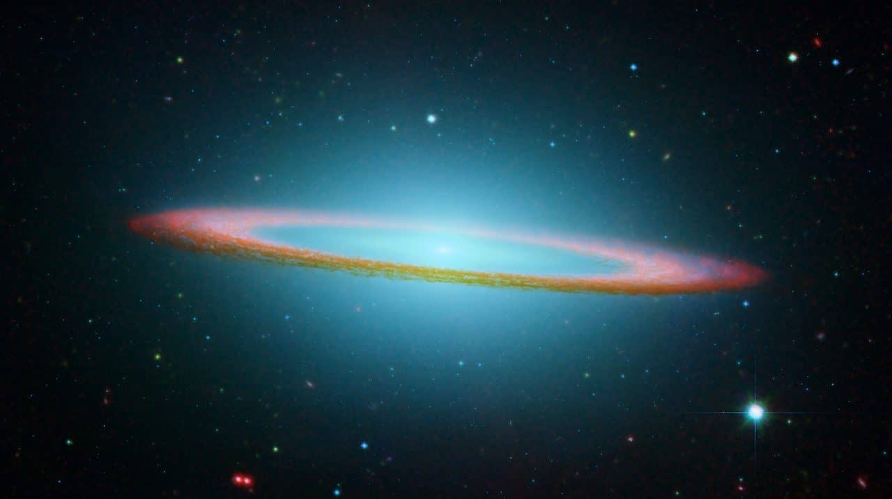 A colorful, circular galaxy in space.