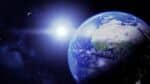 A picture of earth from space and a very bright star.