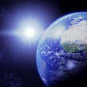 A picture of earth from space and a very bright star.