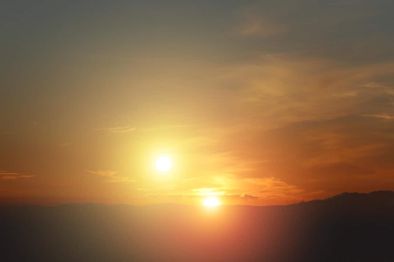 twosunsnasa Two bright yellow suns in a brown and orange sky