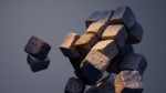 A group of rocks falling in the air.