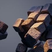 A group of rocks falling in the air.