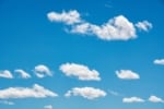 Beautiful white clouds scattered on a blue sky.