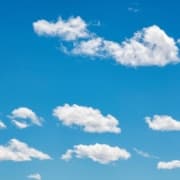 Beautiful white clouds scattered on a blue sky.